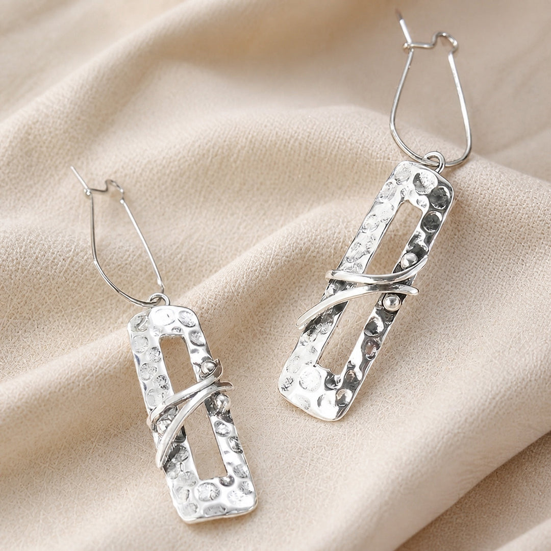 Elongated Silver Rustic Earrings