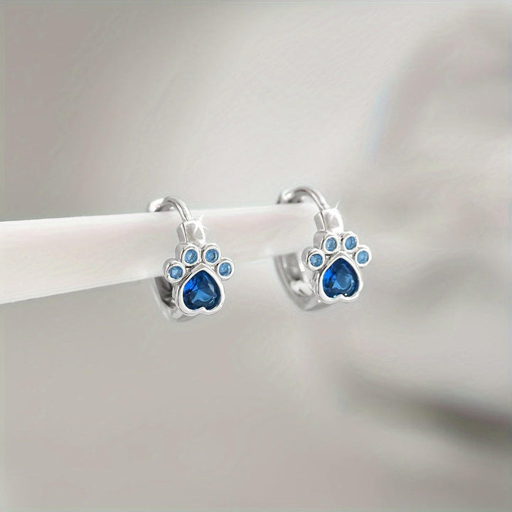 Sapphire Paw Huggie Earrings