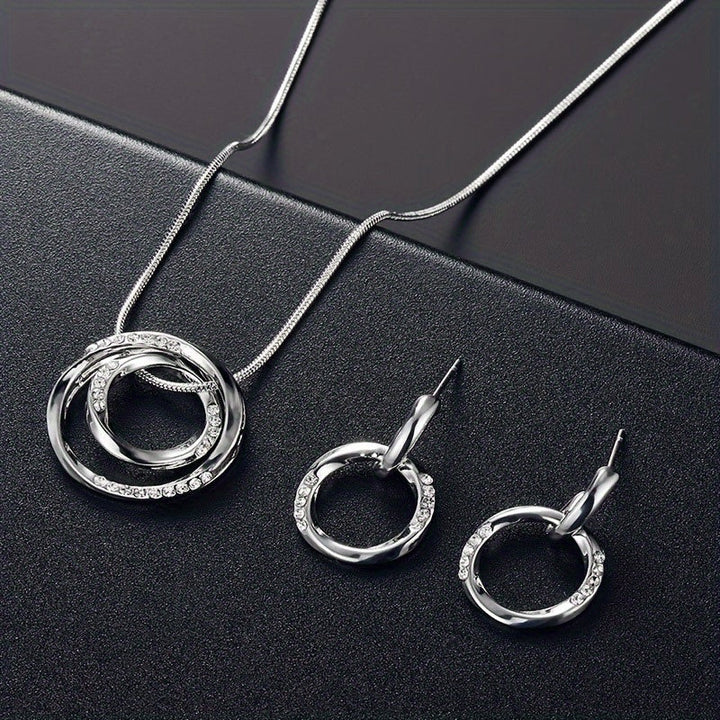 Elegant Mobius Pendant Set