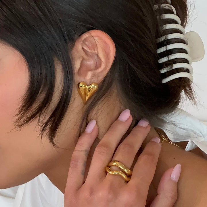 Stylish Gold Pointy Heart Studs