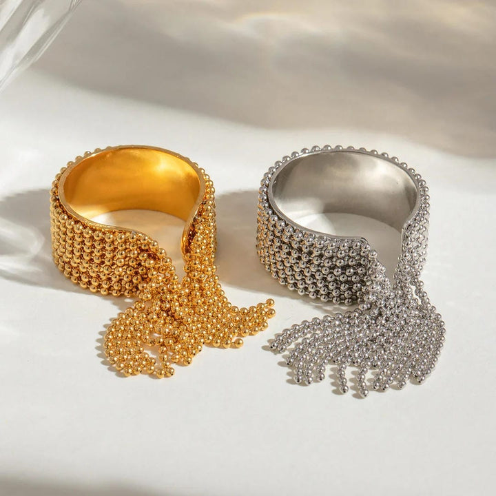 Radiant Gold Tassel Ring