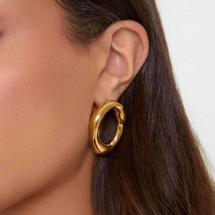 Elegant Curved Gold Open Oval Earrings