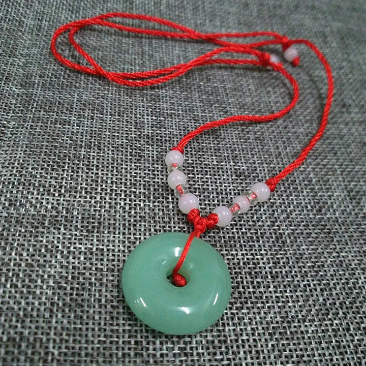 Graceful Jade Disc Pendant
