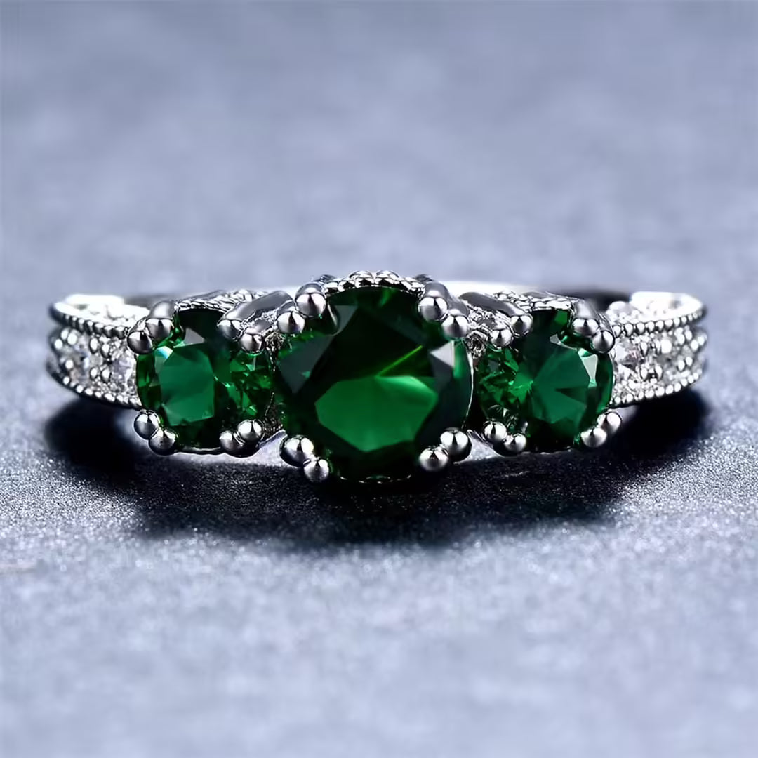 Sculptural Touch Emerald Ring