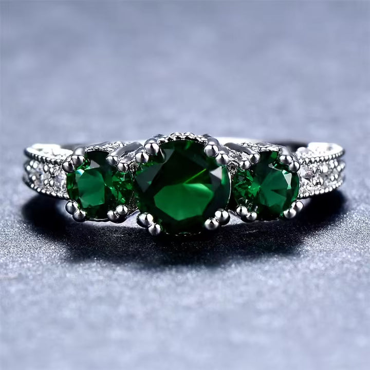 Sculptural Touch Emerald Ring