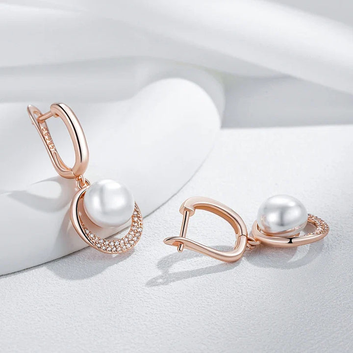 Iconic Rose Gold Pearl Dangle Earrings