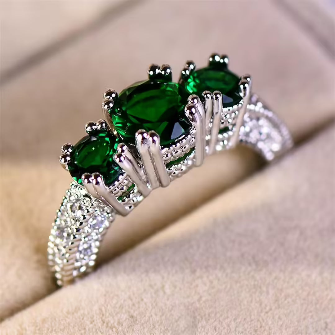 Sculptural Touch Emerald Ring